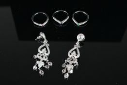 18K WHITE GOLD EARRINGS AND STACKING RING SET OF JEWELLERY, pair of drop earrings stamped 18k, three