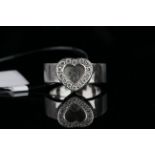 18CT WHITE GOLD HEART SHAPED HEAVY RING, heart ring stamped 750, gross weight 13g.