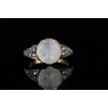 Moonstone and diamond ring, 1 moonstone set to the centre, total of 16 diamonds set to the