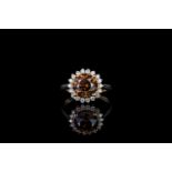 Cognac diamond cluster ring, one round brilliant cut cognac diamond totalling 3.10ct, 4 claw set,