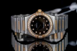 LADIES OMEGA CONSTELLATION WRISTWATCH, circular brown dial with diamond hour markers, diamond set