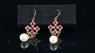 NEW OLD STOCK, Ruby and pearl drop earrings, five round cut rubies with a 7.5mm pearl suspended