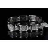 Heavy Diamond set Platinum bracelet, princess cut diamonds set within a heavy platinum link