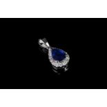 Sapphire and diamond pendant, 1 pear shape sapphire estimated 0.96ct, 16 round brilliant cut