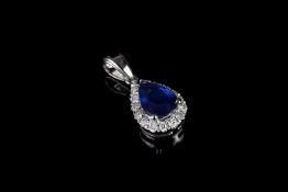 Sapphire and diamond pendant, 1 pear shape sapphire estimated 0.96ct, 16 round brilliant cut