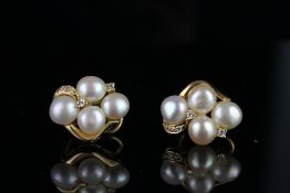 Pair of pearl and diamond? earrings, total of 8 pearls, total of 10 round brilliant cut diamonds,