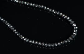 NEW OLD STOCK, UNWORN RETIRED STOCK - A black diamond bead necklace, faceted black diamond beads