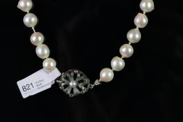 Pearl necklet, on white metal marcasite set clasp, approximate length 44cm.