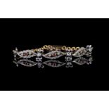 French Victorian ruby and diamond bow bracelet, 3 panels spaced with diamond set bows, set with 3