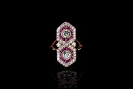 Ruby and diamond ring, 2 round brilliant cut diamonds estimated 0.67ct, surrounded by 24 free-form