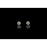 Diamond stud earrings, 2 diamonds, 4 claw set, 9ct white gold, 2 butterfly backs unknown metal,