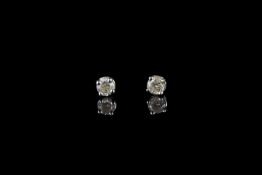 Diamond stud earrings, 2 diamonds, 4 claw set, 9ct white gold, 2 butterfly backs unknown metal,