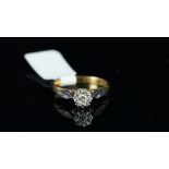 Single stone brilliant cut diamond ring, illusion set, mounted in yellow and white metal stamped