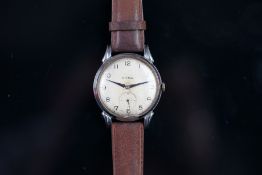 VINTAGE OVERSIZED CYMA DRESS WATCH, circular cream dial, black Arabic numerals, subsidiary seconds