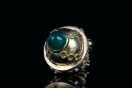 Emerald set pendant , Â 4 emeralds set to the top, 1 cabochon cut emerald set to the bottom,
