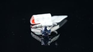 NEW OLD STOCK, Sapphire and diamond ring, round cut sapphire estimated weight 1.69ct, diamond set