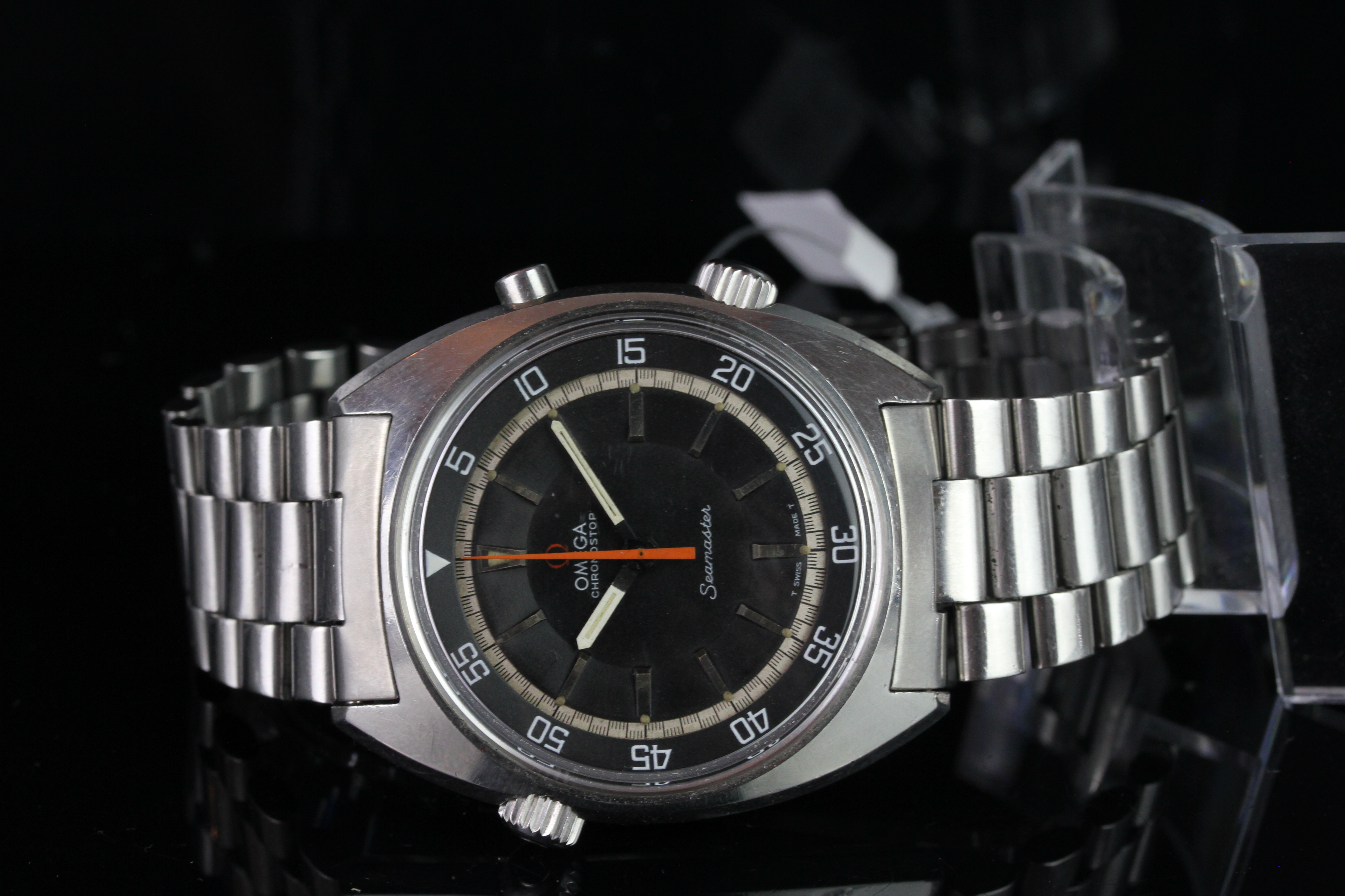 GENTLEMEN'S OMEGA SEAMASTER , round, black dial with illuminated hands and orange second hand,