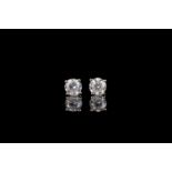 Pair of diamond stud earrings, 2 round brilliant cut diamonds estimated 1.99ct, 4 claw set, 14ct