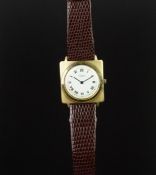 MID SIZE UNIVERSAL GENEVE 18K GOLD DRESS WATCH, circular white dial with roman numerals and gun