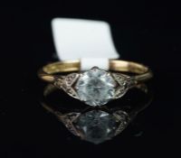 Single stone white sapphire ring, mounted in white metal on a yellow metal shank, stamped 9ct