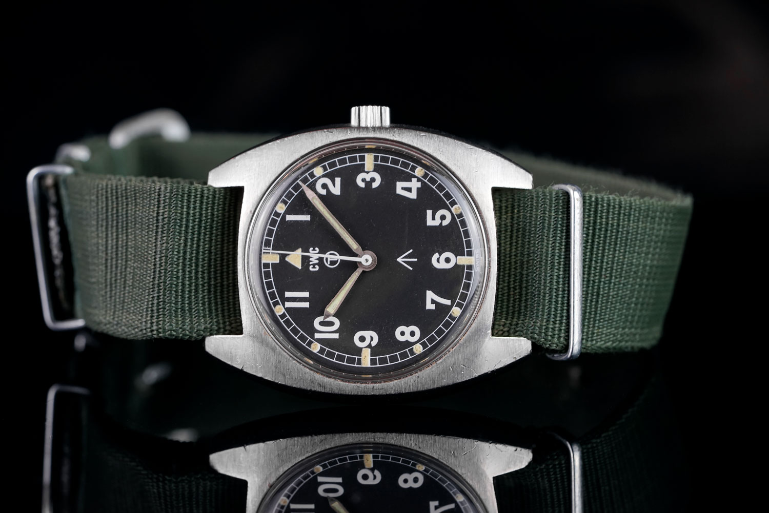 GENTLEMEN'S CWC MILITARY 'CROWS FOOT' W10 WRISTWATCH CIRCA 1973, circular black tritium dial with