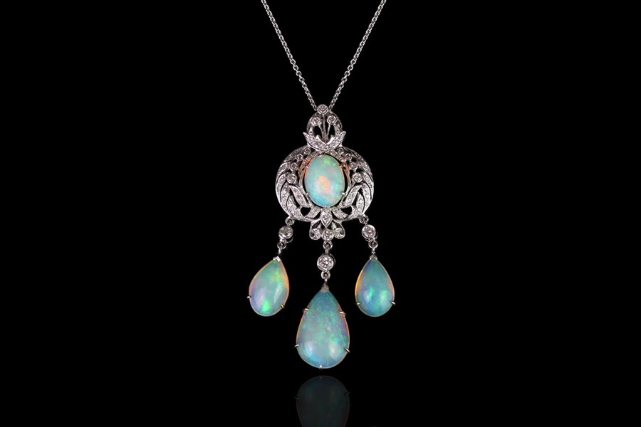 Opal and diamond necklace, centre cabochon cut opal approximately 10.5mm x 8mm, claw set within a - Image 2 of 3
