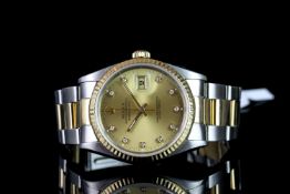 GENTLEMAN'S ROLEX DATEJUST MODEL 6233 SN X809264 CIRCA 1991, round , champagne dial with gold hands,