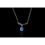 Blue Topaz & diamond set necklace, 1 blue topaz measuring approximately 9.2mm x 7.2mm, 4 claw set, 6