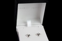 Cubic zirconia fancy earrings w/ box, stamped 18ct white gold, set with 2 cubic zirconias, stamped