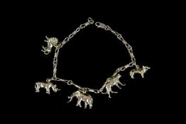 BIG FIVE AFRICAN ANIMAL 18K CHARM BRACELET, lobster claw is 9ct,charms stamped 18ct not