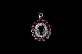 Ruby and Diamond Pendant, set with 1 oval cut ruby totalling 0.92ct, surrounded by 20 round