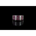Ruby and diamond ring, set with 18 round cut rubies totalling 2.24ct, 24 round brilliant cut