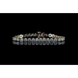 Diamond tennis bracelet, set with 37 round brilliant cut diamonds totalling 6.60ct, hallmarked