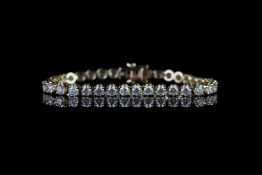 Diamond tennis bracelet, set with 37 round brilliant cut diamonds totalling 6.60ct, hallmarked