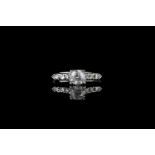 Diamond cluster ring, set with 1 round brilliant cut diamond totalling 0.76ct, 6 round brilliant cut