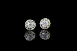 Pair of Diamond cluster earrings, set with 2 round brilliant cut diamonds totalling 1.41 ct,