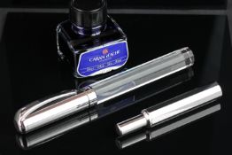 DANIEL SWAROVSKI LIMITED EDITION KRYSTALLOS FOUNTAIN PEN SET, faceted crystal body with sterling