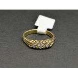 Three stone diamond ring, mounted in hallmarked 18ct yellow gold, three round brilliant cut diamond,