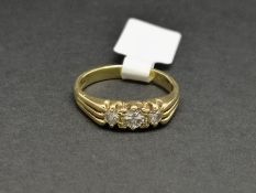 Three stone diamond ring, mounted in hallmarked 18ct yellow gold, three round brilliant cut diamond,