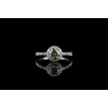 Cognac diamond cluster ring, set with 1 light brown round brilliant cut diamond totalling 0.74ct,