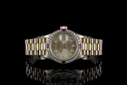 LADIES ROLEX OYSTER PERPETUAL DATEJUST 18CT GOLD DIAMOND & RUBY SET WRISTWATCH REF. 69178,