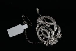 DIAMOND SPRAY BROOCH, approx 2.5ct of graduating stones, brilliant cut, claw set, colour J/H, SI,