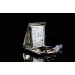 ANTIQUE ESZEHA TRAVEL POCKET CLOCK, rectangular off white patina dial with unusual black arabic