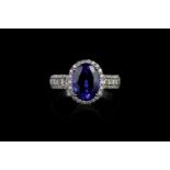 Tanzanite and Diamond ring, set with 1 oval cut tanzanite approximately 3.38ct, 4 claw set,