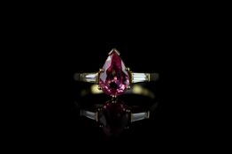 Pink sapphire & diamond set ring, pear shaped pink sapphire set to the centre measuring