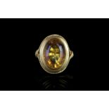 LARGE CITRINE ESTIMATED 17X 12 MM, chenier setting, hallmarked 18ct, ring size N, total weight 9.4