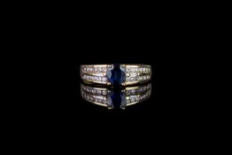 Sapphire and diamond ring, 1 sapphire in the centre, 4 claw set, 2 baguette cut diamonds either
