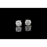 Pair of Diamond stud earrings, set with 2 round brilliant cut diamonds totalling 1.91ct, 4 claw set,