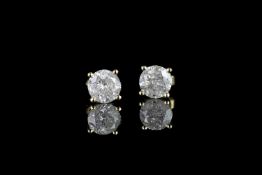Pair of Diamond stud earrings, set with 2 round brilliant cut diamonds totalling 1.91ct, 4 claw set,