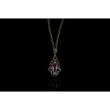 Garnet necklace with broken chain, set with 1 garnet measuring approximately 6.13mm x 4.07mm,